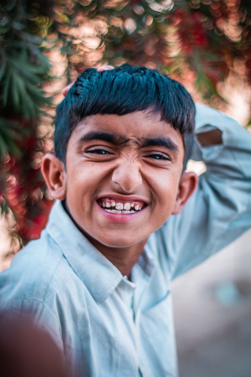 Happy child smiling outdoors
