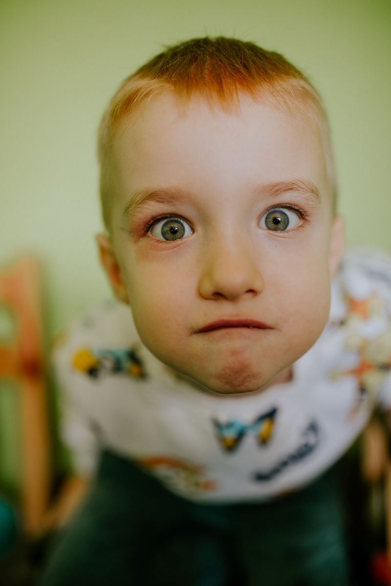 Curious child with a big smile